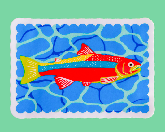 Colourful rainbow trout on a blue wave pattern sticker displayed on a green background