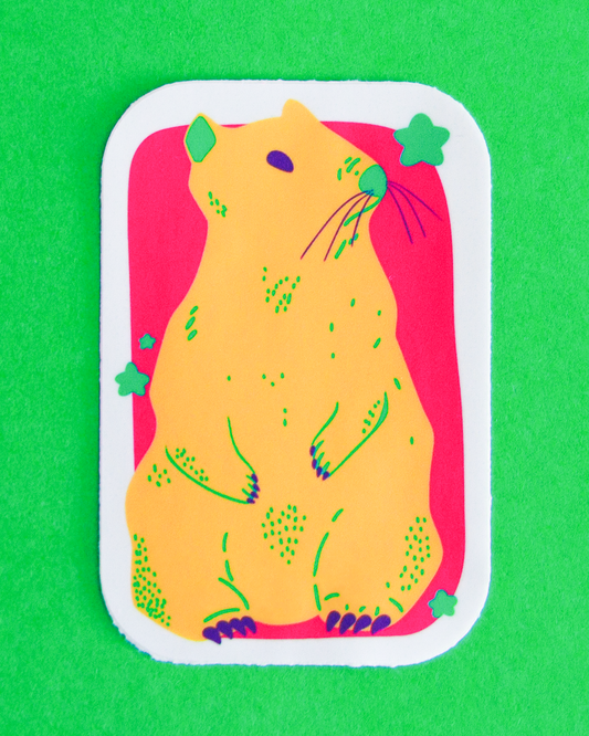 Orange marmot illustrative sticker with pink background and green and purple details. Green backdrop.