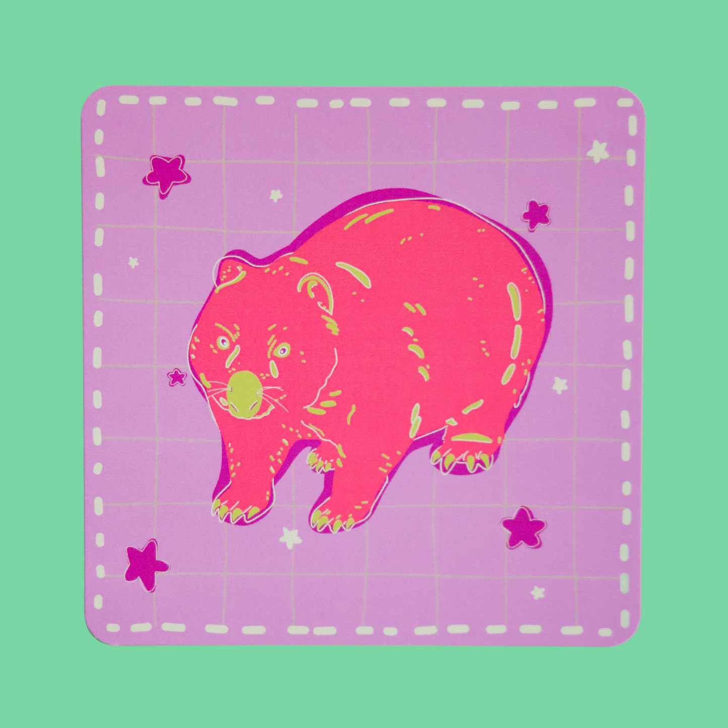 Bright and colourful illustration print of a pink wombat with green markings on a background of light purple and light green checkered lines. Dark purple and light green stars are sprinkled around the background. A thick pill dotted line borders the square print. The print is framed by a light green background.